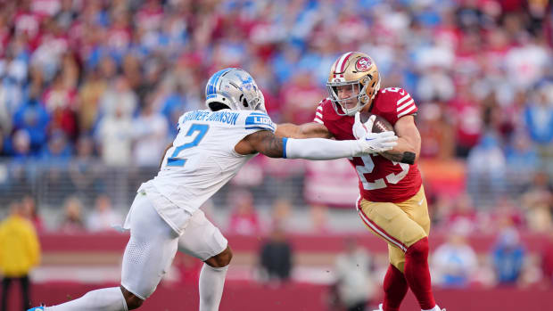Jan 28, 2024; Santa Clara, California, USA; San Francisco 49ers running back Christian McCaffrey (23) stiff arms Detroit Lions safety C.J. Gardner-Johnson (2) during the first half of the NFC Championship football game at Levi's Stadium. Mandatory Credit: Kyle Terada-USA TODAY Sports 